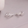 Xuhui brand exquisite and light luxury copper plated with real gold and zircon 925 silver needle ribbon design fashionable stud earrings details Picture